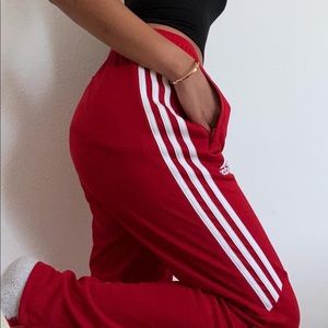 Red Adidas track pants 🏎